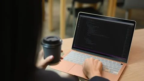 Close up view of software developer working on web site project, programming on Stock Photos
