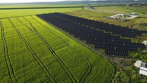 An up-close view of solar panels with a dramatic Stock Footage 240339789