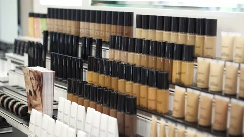 Close view of some paint pots for makeup displayed in a store with slow Video stock 138710425