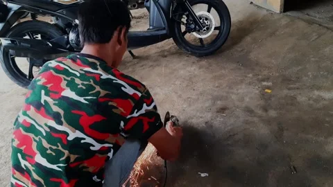 Close up view of someone welding iron taken from a high angle Video stock 295887229