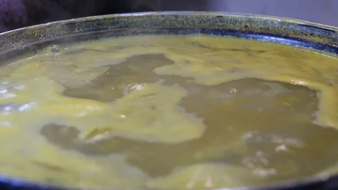 Close up view soup boils in a pan	 動画素材 120415422