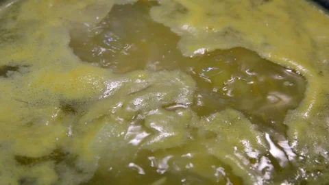 Close up view soup boils in a pan	 Видео 120415511