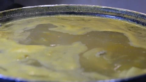 Close up view soup boils in a pan	 Vídeo Stock 120415546