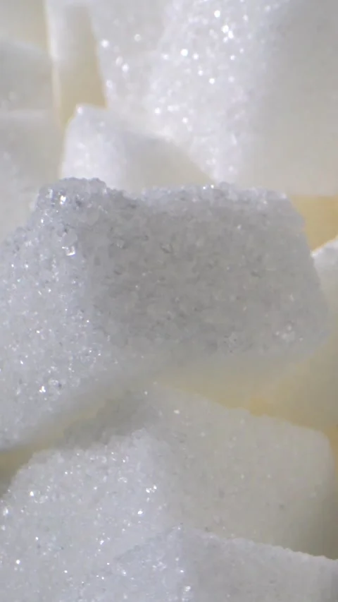 Close-up view of sparkling sugar cubes stacked together in a bright kitchen Stock Footage 320271901