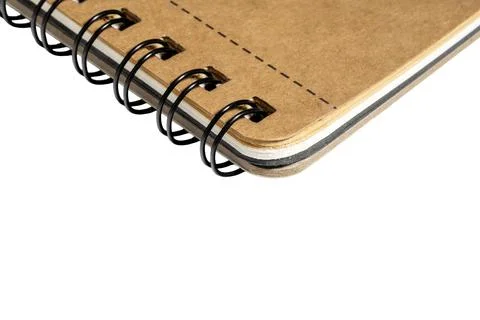 Close view spiral binding notebook cardboard cover tear line detail Stock Photos