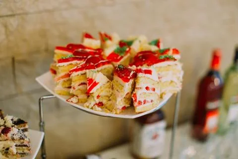 The close-up view of the sponge cakes decorated with red jelly Stock Photos