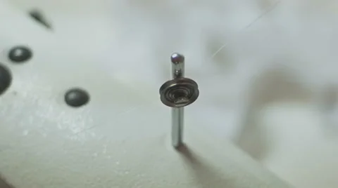 Close-up View of Spool and threat on Working Sewing Machine. Stock Footage 61250690