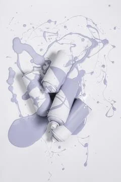 Close up view of spray paint in cans covered with grey paint isolated on whit Fotos de archivo