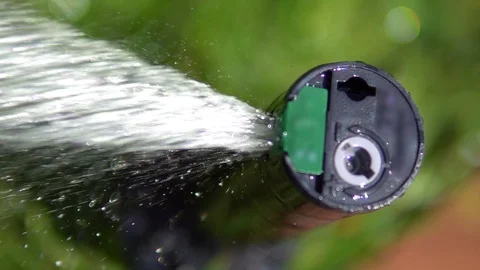 Close view of a sprinkler wathering the grass, lawn Stock Footage 114004170