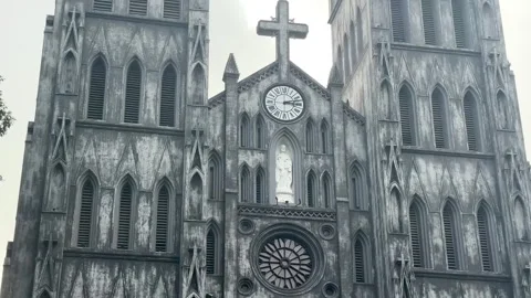 Close View of St Josephs Cathedral Rose Window Clock and Gothic Architecture in Stock Footage 337956468