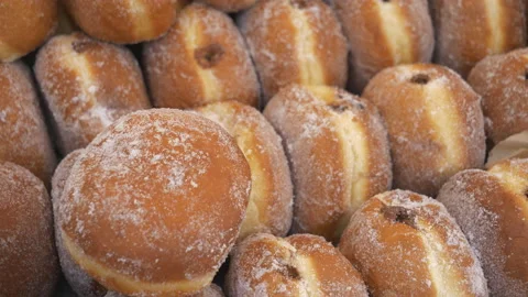 A close up view of a stack of chocolate donuts. Stock Footage 111140225