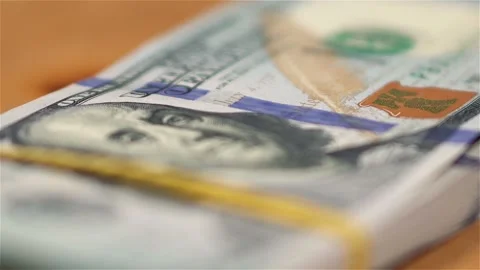 Close up View of Stack of Dollar Bills Rotating Stock Footage 131476009