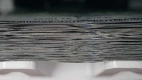 Close-up view of stacked currency notes showing detailed texture and alignment, Stock Footage 333979085