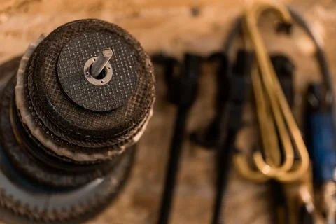 A Close-Up View of Stacked Weight Plates and Various Fitness Equipment Stock Photos