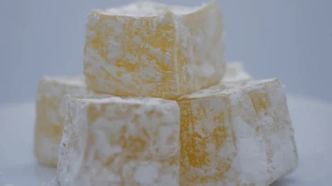 A close up view of stacked up yellow Turkish delights. Stock Footage 201210416