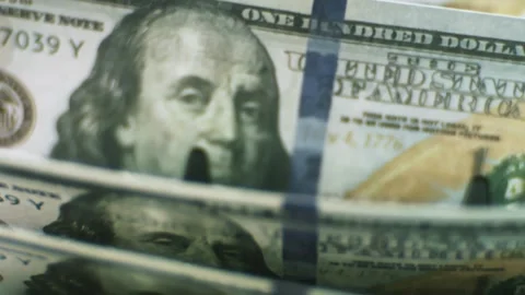 Close up view of stacks of american hundred dollar bills moving through a c.. Stock Footage 337447754