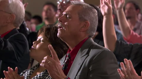 Close view of standing congregation singing with closed eyes Stock Footage 59532090