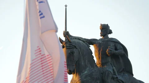 Close view of statue of King Tomislav and a waving flag in Zagreb, Croatia Stock Footage 60834181