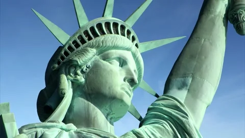 Close up view of the Statue of Liberty - blue sky with clouds in time lapse Stock Footage 148988184