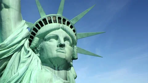 Close up view of the Statue of Liberty - blue sky with clouds in time lapse Stock Footage 148988211