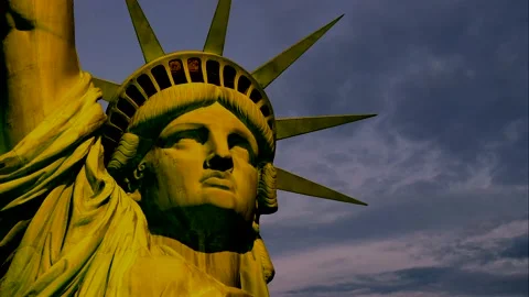 Close up view of the Statue of Liberty - time lapse sky - night to sunrise Stock Footage 149001869