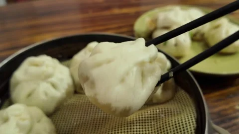Close View of Steamed Buns and Savory Filling in Shanghai Stock Footage 340176870