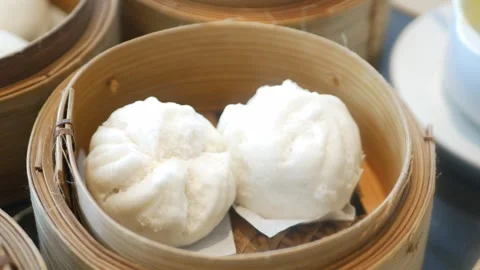 Close up view to a steamer full with chinese bun dimsum in hongkong style w.. Stock Footage 323913669