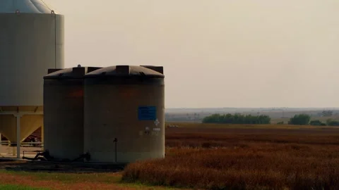Close view of steel grain bins on a Kansas farm Stock-Footage 345530632
