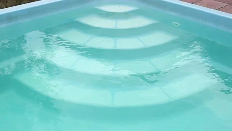 Close-up view of the steps of a swimming pool filled with water. Stock Footage 160220294