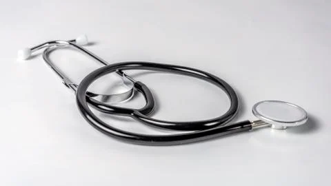 Close up view of stethoscope over isolated white background. Stock Photos