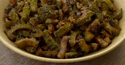 Close-up view of stir fried bitter melon. Stock Footage 284087215