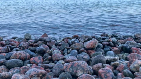 Close up view of stone beach and calm sea at the evening time Stock-Footage 145499183