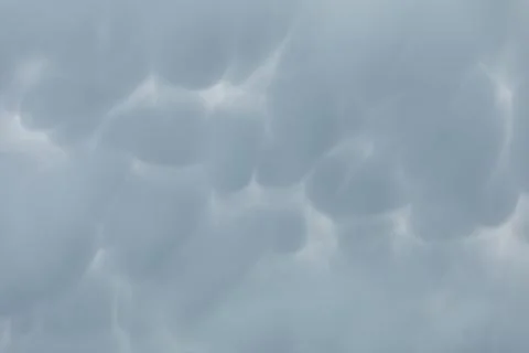 Close-up view of storm clouds billowing in the sky. An overcast sky. Stock-Fotos