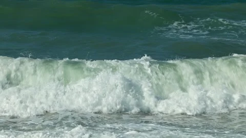 Close up view of storm waves crashing onto pebble beach on Cretan Sea coast. Stock Footage 340072529