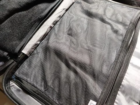 Close-up view of a suitcase interior organized with soft towels  Stock Photos
