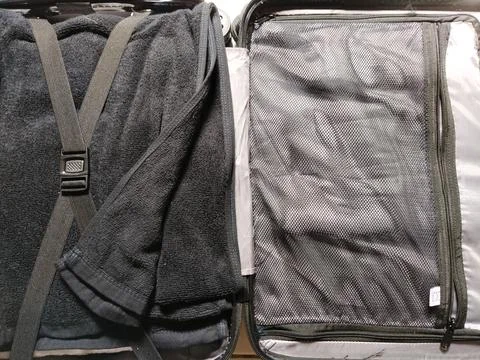 Close-up view of a suitcase interior organized with soft towels  Stock Photos