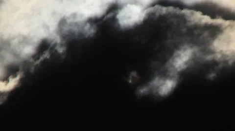 Close up view of the sun as clouds move by in timelapse Stock Footage 45581876