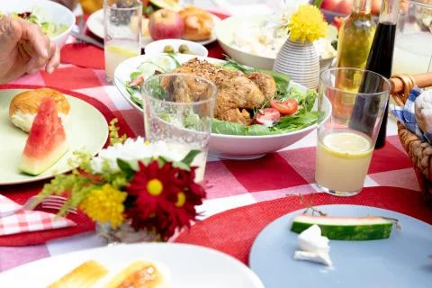 Close up view of a table set during a family lunch in the garden Stock Photos