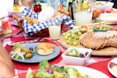 Close up view of a table set during a family lunch in the garden Stock Photos