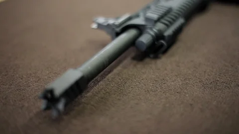Close-up view of tactical rifle barrel on the table Stock Footage 91978149