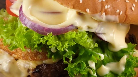Close-up view of Tasty fresh Burger, Classic of Fast Food Stock Footage 79642118