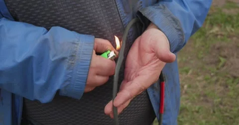 Close-up view of a technicians hands repairing a broken electrical cable Stock Footage 335022307