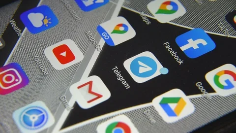 Close-up view of Telegram icon app on an Android smartphone, including other ico Stock Footage 127746283