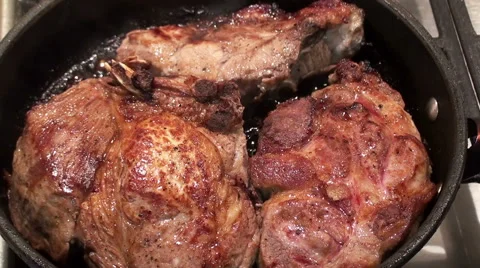 Close-up view of testing the readiness of grilled meat Stock Footage 61214347