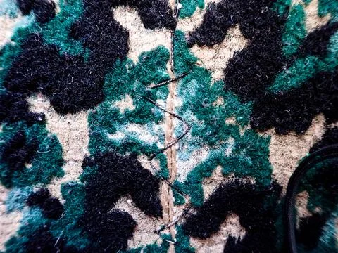 Close up view of the texture and abstract pattern on the carpet Fotos de archivo