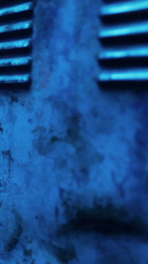 Close view of a textured blue surface with metal lines and marks present Stock Footage 339510732