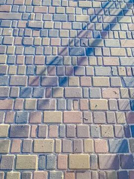 Close-up view of textured brick surface, interlocking pattern, varying colo.. Stock Photos