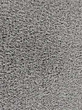 A close-up view of a textured concrete surface, displaying intricate patterns Stock Photos