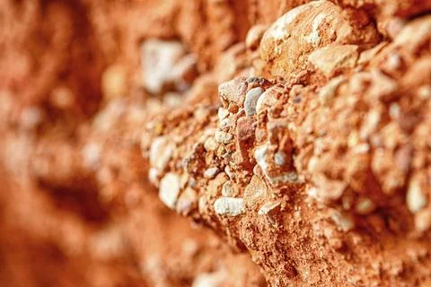 Close-up View of Textured Red Soil With Small Stones Found in a Natural Stock Photos