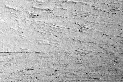 Close-up View of Textured Wall Surface Showcasing Patterns and Depth Under .. Stock Photos